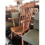 A Windsor slat back elbow chair