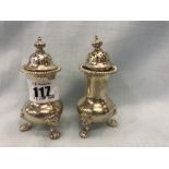 A set of hallmarked silver salt and pepper pots,