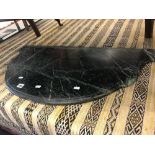 A Demi lune green marble table top