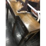 A mahogany break front console/ hall table