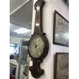 A large mahogany barometer,