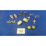 Six pairs of assorted silver earrings