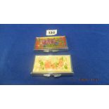Two steel and enamel floral pill boxes