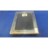 A hallmarked silver photo frame,