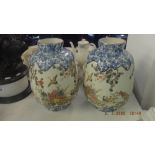 A pair of decorative oriental vases
