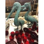 A pair of bronze verdigree pelicans