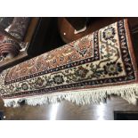 A pair of decorative rugs