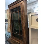 A walnut corner cabinet