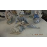 A Lladro figure of ballet dancers