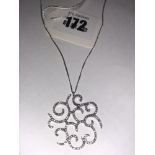 An 18ct white gold/ diamond pendant on 18ct white gold chain, approx.