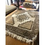 A pair of Persian handmaid rugs