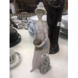 A Lladro figure of a lady,