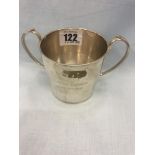 A hallmarked silver twin handled 'Lovers' cup,