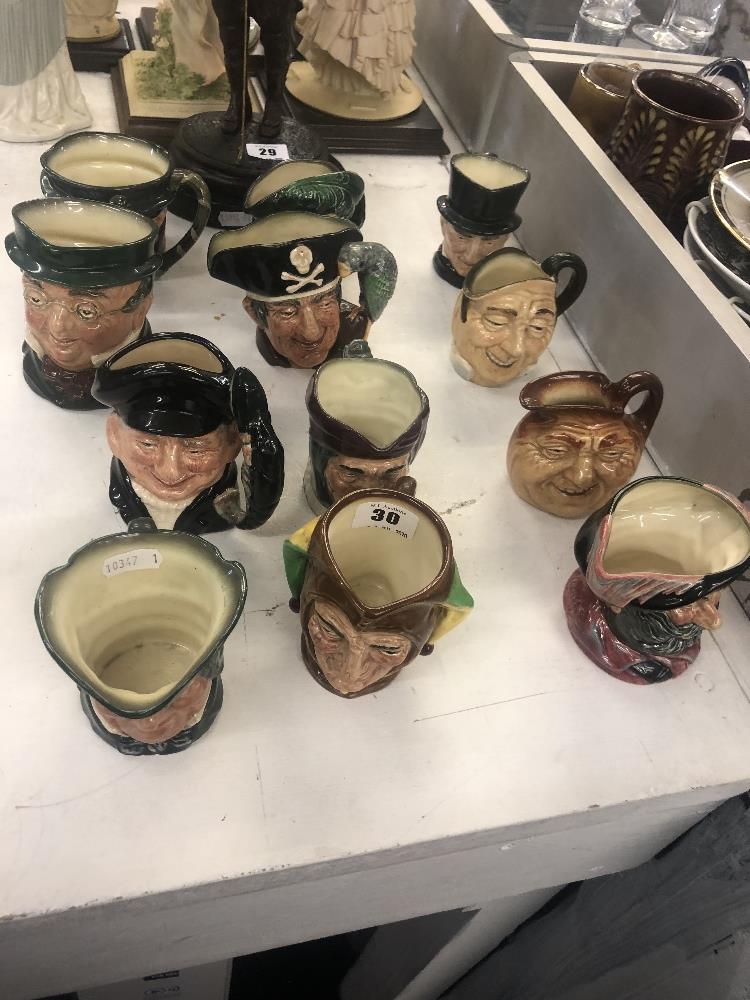 A dozen Royal Doulton character jug