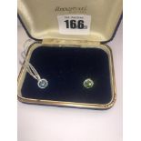 A pair of 18ct white gold and blue diamond earrings