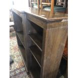 An oak break front bookcase