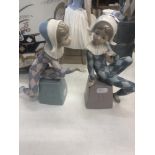 A pair of Lladro figures of children