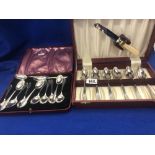 Twelve silver tea spoons and a silver plated grape fruit