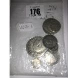 An assortment of English solid silver coins