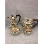 A four piece silver tea set,