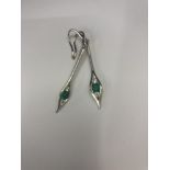 A pair of 18ct white gold,