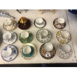 A collection of coffee cups and saucers,