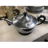 An early silver plated insulated tea pot