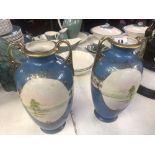 A pair of blue and gold Japanese vases