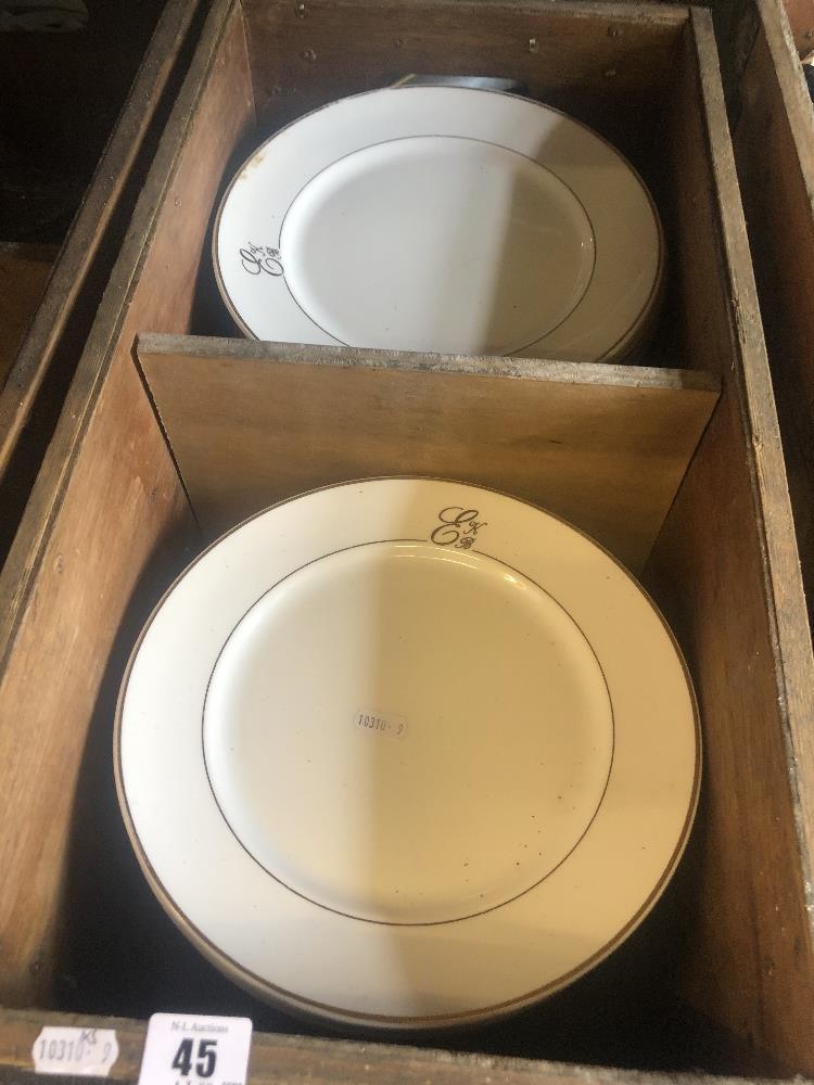 A very large qty of white and gold plates,