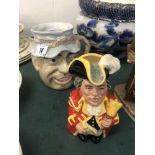 A Royal Doulton 'John Barleycorn' figure and a town crier figure