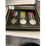 A framed set of medals