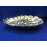 A continental silver hammered serving dish