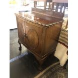 A two door mahogany side cabinet