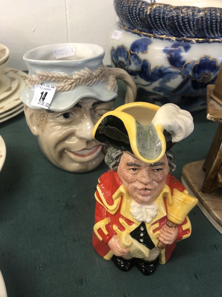 A Royal Doulton 'John Barleycorn' figure and a town crier figure