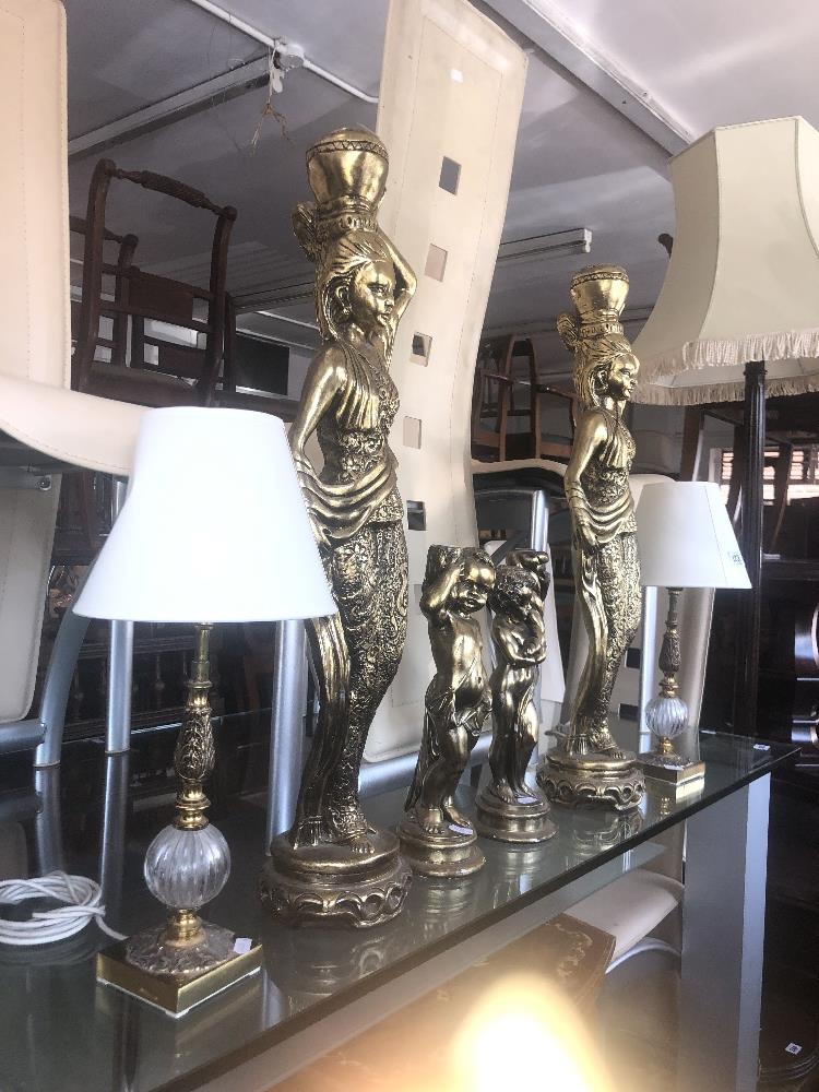 Four decorative figures and two lamps