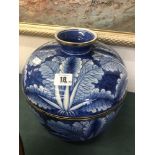 A large blue and white lidded bowl