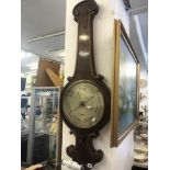 A large mahogany barometer,