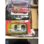 Six Scalextric cars,