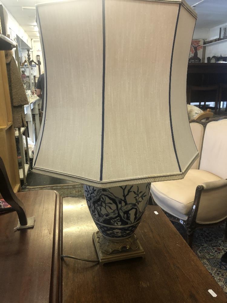 A large blue and white lamp