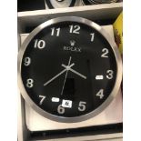 A Rolex advertising clock