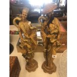 A pair of decorative oriental figures
