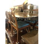 A regency style table and chairs