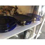 Twelve blue and gold cake stands,