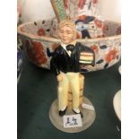 A Royal Doulton figure 'Tom Brown'