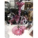 A cranberry glass epergne,