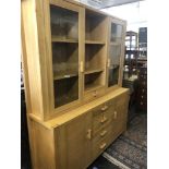 An oak glazed dresser,