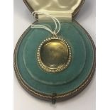 15ct gold locket surround by pearls, original box, 11 grams gold