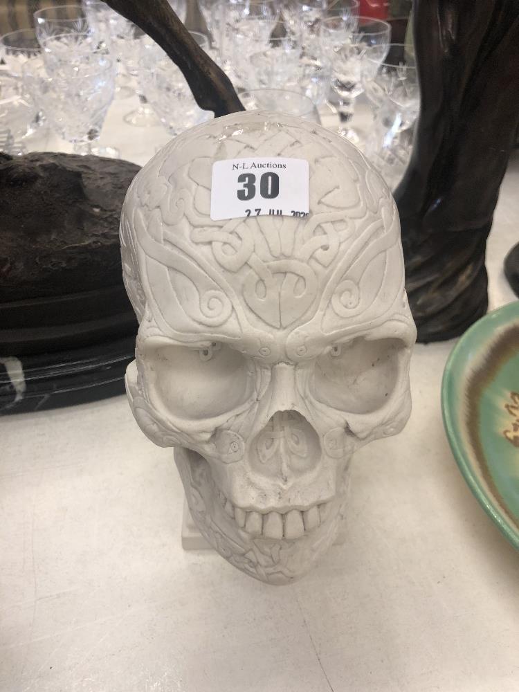 A figure of a skull