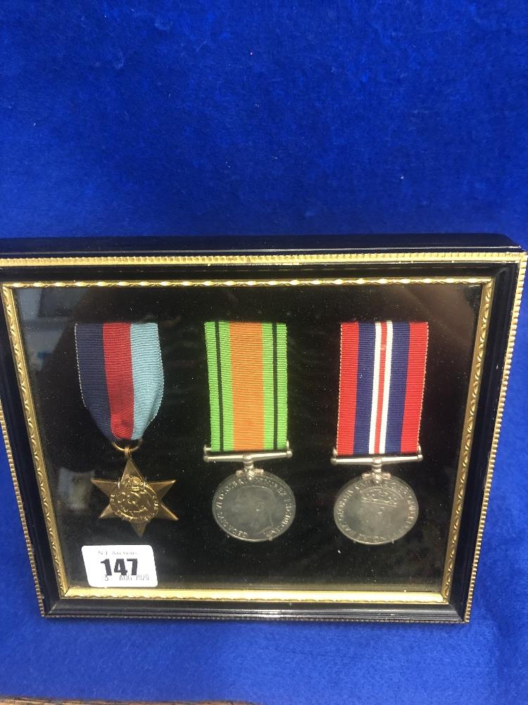 A framed set of medals