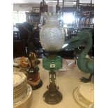 A Victorian oil lamp,